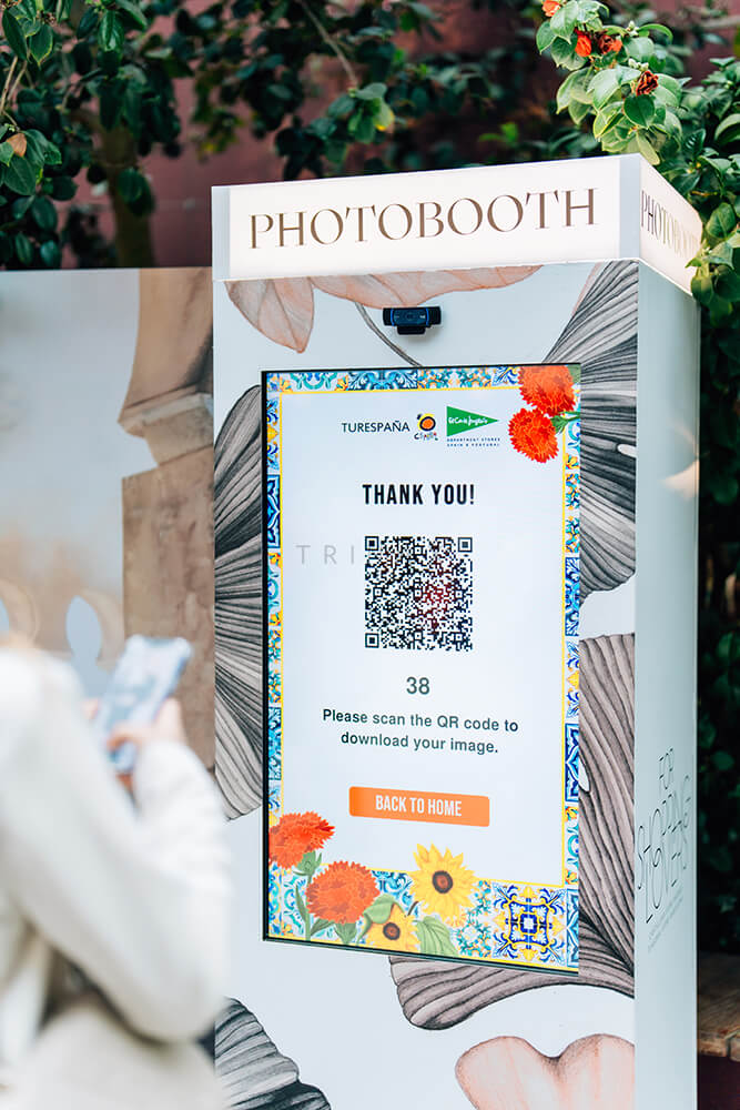 Trinax Interactive Photo Booth | Spain Tourism Flower Dome Instant Photo Booth with Filters For Leadgen and Awareness Campaign
